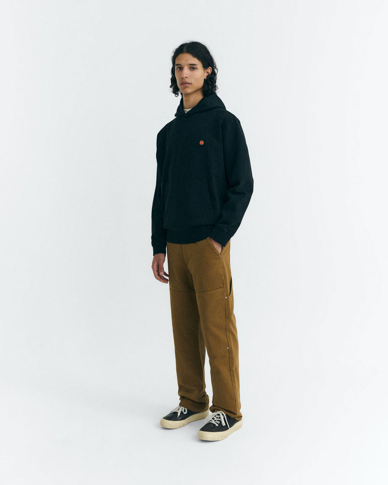 Hoodie negro sol naranja espalda Simon sostenible - 2